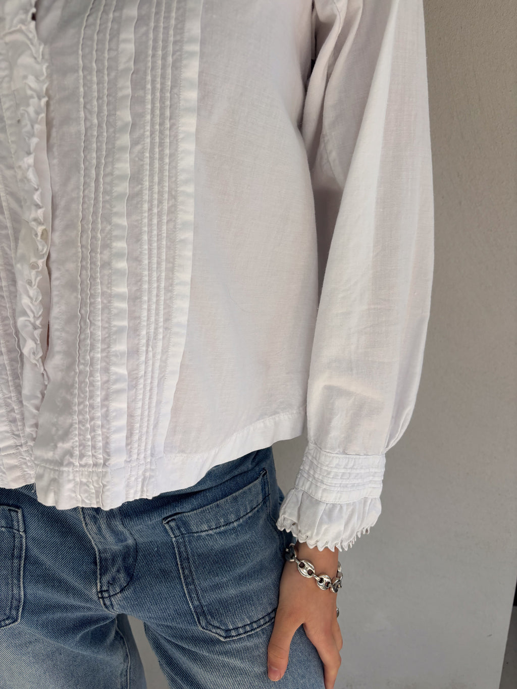 The Delon white blouse